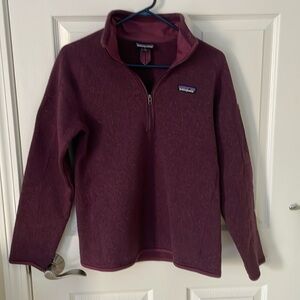 Patagonia is quarter-zip sweater size M
